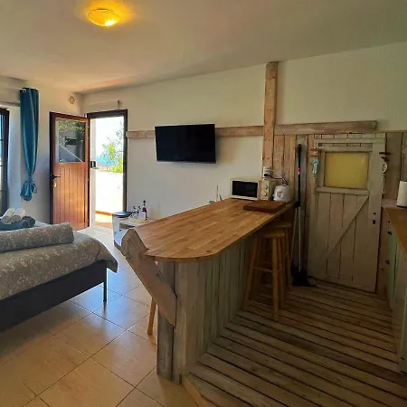 Abajo, Casa Appartement La Costa